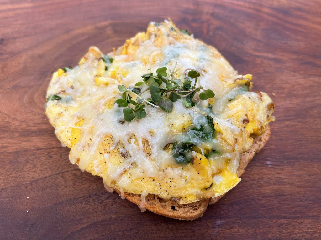 Cheesy Eggs on Toast with Mushrooms and Leafy Greens